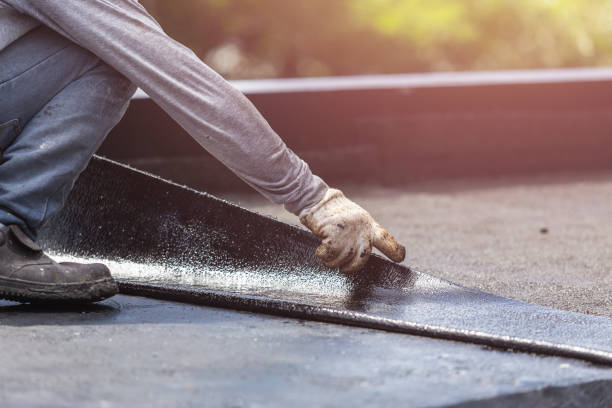 Professional Basement Waterproofing technician working in Oxon Hill, MD